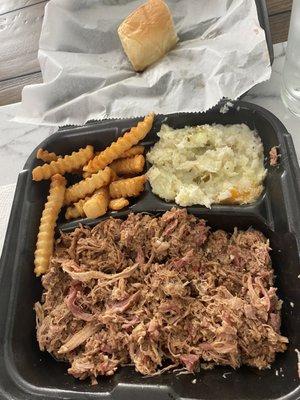 Pork Que with slaw and fries. Huge portion of barbeque!