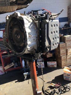 Replacement transmission under 60k miles on a 2013 kia optima sx. 
Was involved in and accident. Aluminum housing broke to pieces.