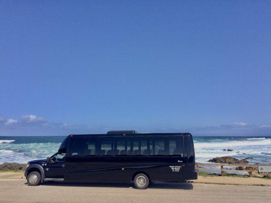 Skylark Limousine's Bus pictured with the  Beautiful California Coast