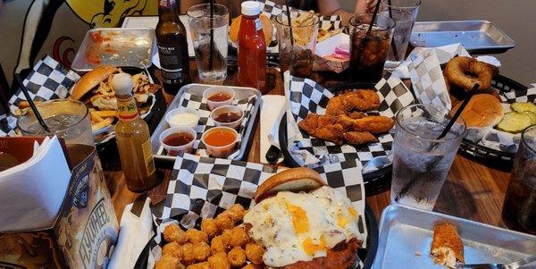 Chicken tenders in the middle. The goood, the bad the bbq, gyro cheeseburge, the classic cheeseburger, and buffalicious.