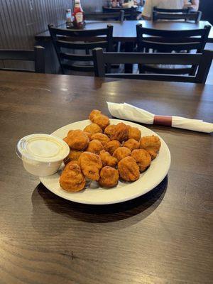 Simple fried mushrooms.  Served hot and surprisingly not greasy.