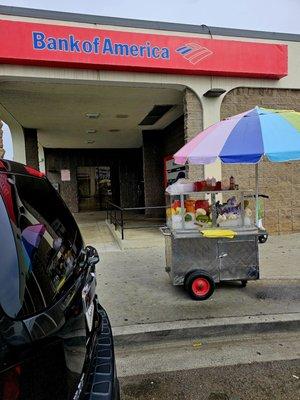 Fruit vendor stand serving customers all year round for your convenience when visiting Bank of America.