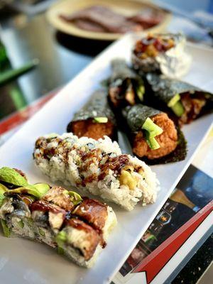 S9. Eel Sushi H3. Spicy Tuna Roll B6. Baked Langostino Roll