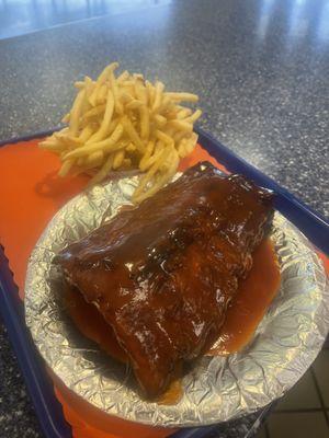 1/2 slab rib tips dinner. Comes with fries and garlic bread.