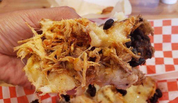 A grab of Arepa De Pabellon with chicken