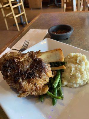 Lamb shank with mashed and green beans