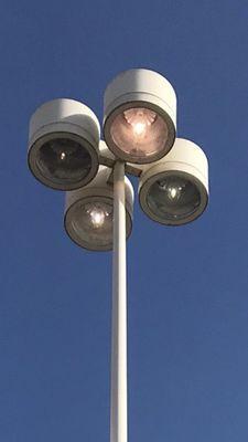 Commercial parking lot pole lights needing some TLC