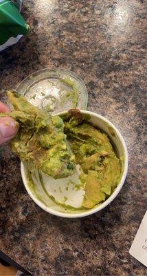 Chunks of rotten avocado