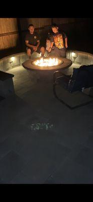 Fire pit and seating wall with embedded light's.