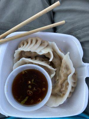 4 out of the six Steamed dumplings with incredible dipping sauce.