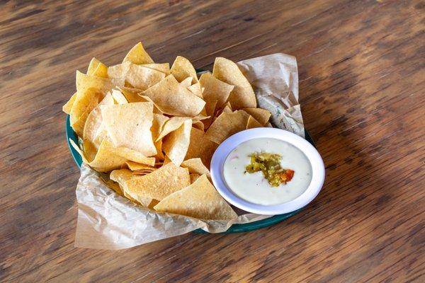 Hatch Green Chile Queso and Chips. A spicy take on our Queso Blanco. Delicious!