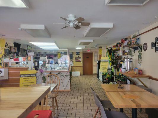 Neat, clean and inviting. High tops and tables.