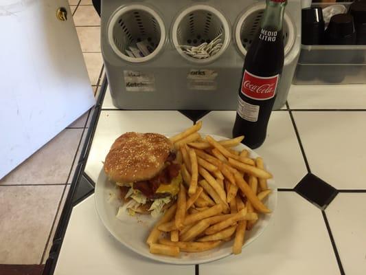 Bacon burger with some fries & a satisfying Coca cola bottle