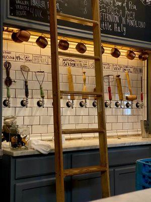 Beer on tap with old pasta making tools