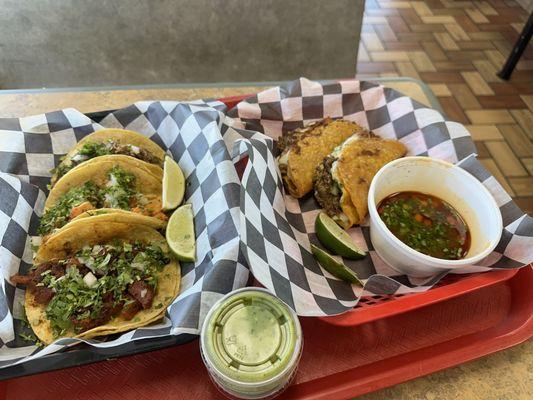 Tacos birria and 3 tacos (chicken, pastor, and Barbados)