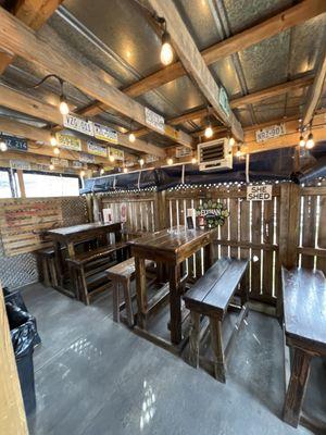 Screened in patio dining area.