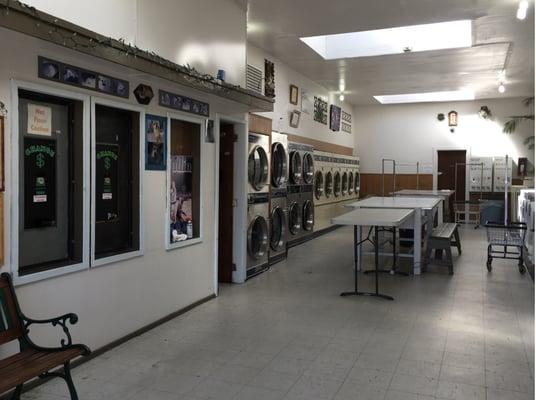 Many dryers including large capacity. Two change machines.