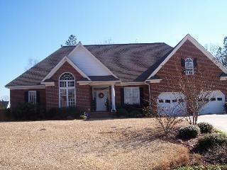 This custom built all brick home has 3/3 bath and a pool.  Located near award winning Dutch Fork High School.