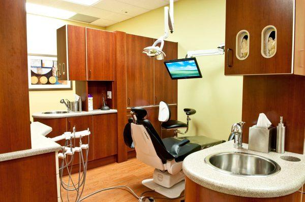 Dental care station with multimedia entertainment for patients.