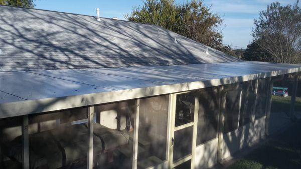 Architectural Shingle and insulated metal panels over porch.