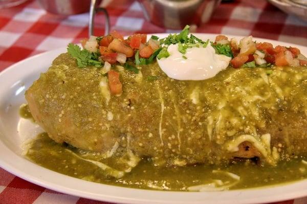 The Chimichanga, garnish is my addition to make it look nice. Just comes normally with chili verde sauce and cheese on top.