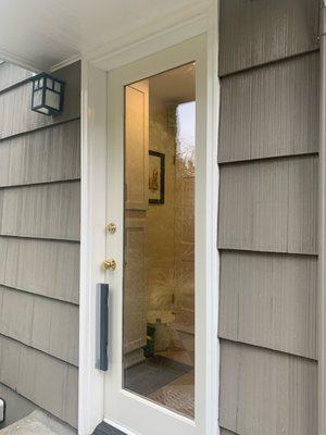 My son's new door after three coats of paint and installation of existing hardware and a new door sweep!