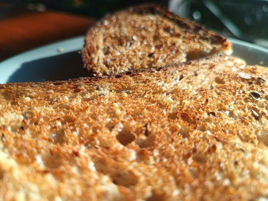 Perricone's multi grain toast and a few poached. Perfect breakfast al fresco.