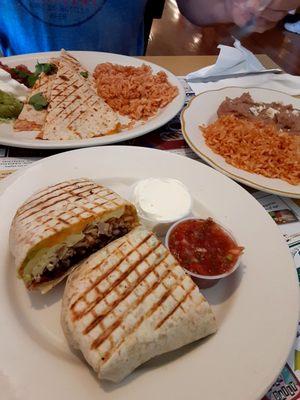 Matador breakfast Burrito + Chicken Quesadillas, rice,beans & quacamole,salsa