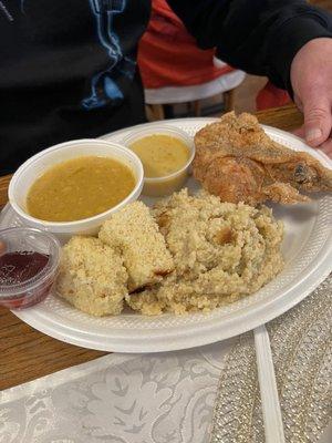 Lunch special fried chicken, dressing, creamed corn, giblet gravy, cornbread