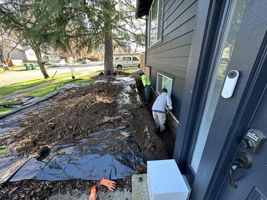 Hand digging to the foundation, to apply waterproofing system and remediate drainage