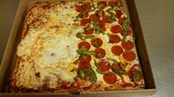 One of our great Sicilian pizzas with pepperoni and green peppers on half fabulous