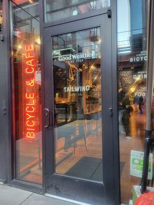 Door to cafe. Shared space with Good Weather bike shop