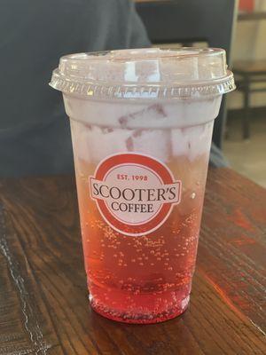 Raspberry Scooot Energy Infusion topped with Raspberry Cold Foam