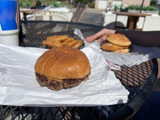 Half pound cheeseburger w/onion rings And the Cod Fish Sandwich. It was delicious.