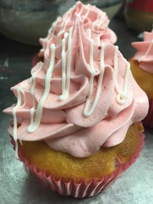 Gluten Free White Cake with Cherry Buttercream drizzled with white chocolate