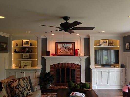 New Juno recessed can lights in ceiling and new LED lighting in the new built-in cabinets at a home in Northbrook