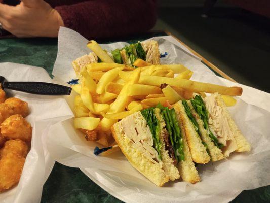 Club sandwich with fries