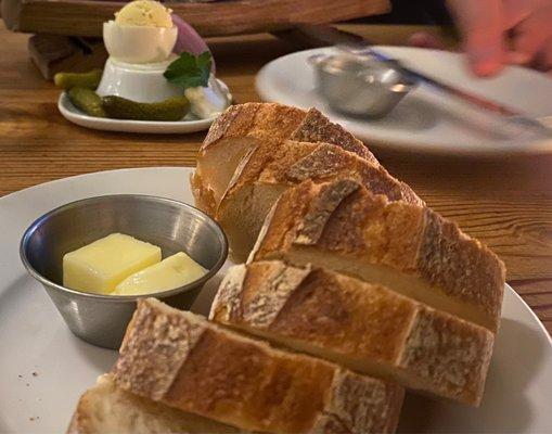 Bread with ouef in background