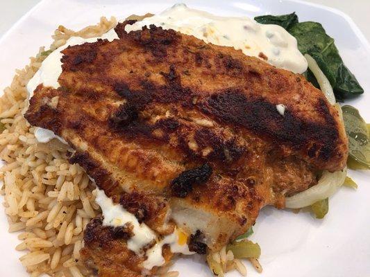 Blackened catfish fillet w/ dirty rice and collard greens