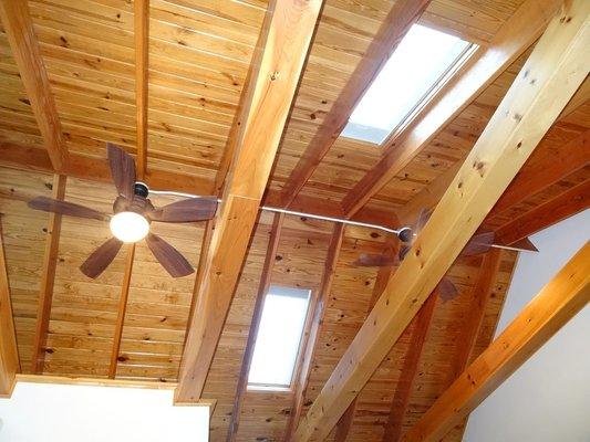 Spacious skylights and overhead fans make for a bright and airy space!