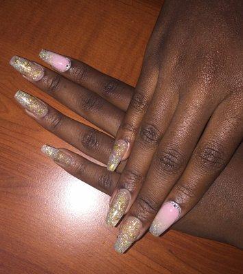 Nails by John. Very nice and affordable. Prices vary from $30-$50.