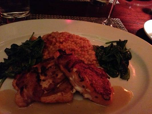 Pancetta salmon with cous cous and spinach