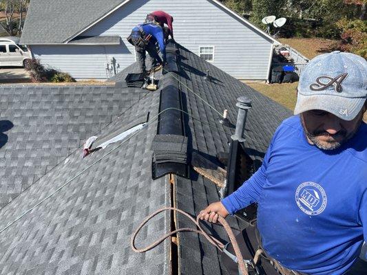 MDJ Roofing and Construction on the roof!