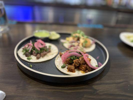 Taco Tuesday, chicken, beef, and shrimp tacos. The sauce they serve with it is delicious, but on the spicy side should be warned!