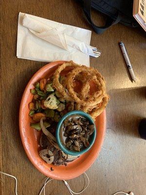 Hamburger steak with mushroom gravy and hand battered onion rings