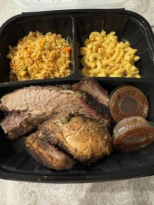 Brisket, chicken, Caribbean rice, and Mac n Cheese