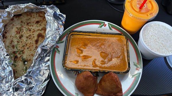 Garlic Basil Naan, Chicken Tikka Masala, Vegetable Samosa, Mango Lassi, white rice.