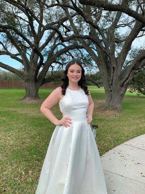 My daughter in my wedding dress, beautifully tailored to fit her.