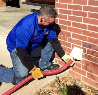 Cleaning the dryer duct with a remote gear driven Rotobrush.