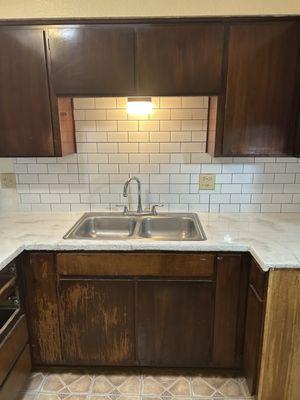 New backsplash and epoxy countertop